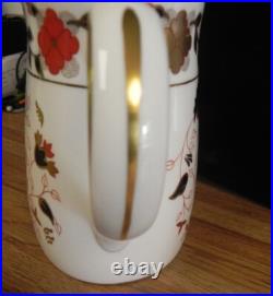 Royal Crown Derby Asian Rose Teapot. 8 IN & LID ON. HAS ORIGINAL BIRD TEA HOLDER