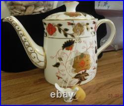 Royal Crown Derby Asian Rose Teapot. 8 IN & LID ON. HAS ORIGINAL BIRD TEA HOLDER