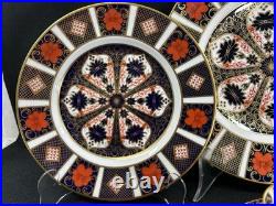 Royal Crown Derby Old Imari 1128(1)5 Piece Place SettingCup has 2 Tiny Chips