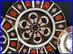 Royal Crown Derby Old Imari 1128(1)5 Piece Place SettingCup has 2 Tiny Chips