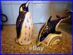 Royal Crown Derby paperweights gold dolphin and silver penguin