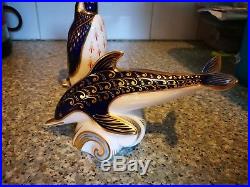 Royal Crown Derby paperweights gold dolphin and silver penguin
