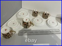 Royal Crown Derby set ofi cups and saucers