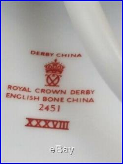 Royal crown derby imari 2415 has been kept in cabinet has got hair line mark