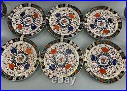 Set of 12 English Royal Crown Derby Dinner Plates in the Imari Palette