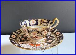 Set of 12 Royal Crown Derby Traditional Imari (#2451) footed teacup withsaucer